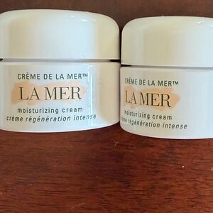 A bundle of 2 La Mer The Moisturizing Cream - each 0.12 oz